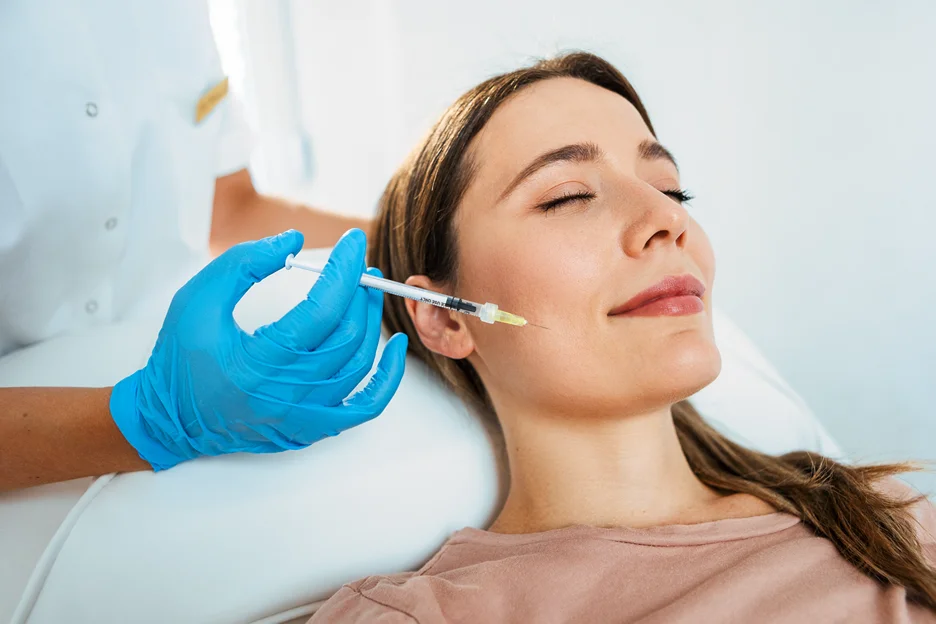 A woman getting cheek fillers