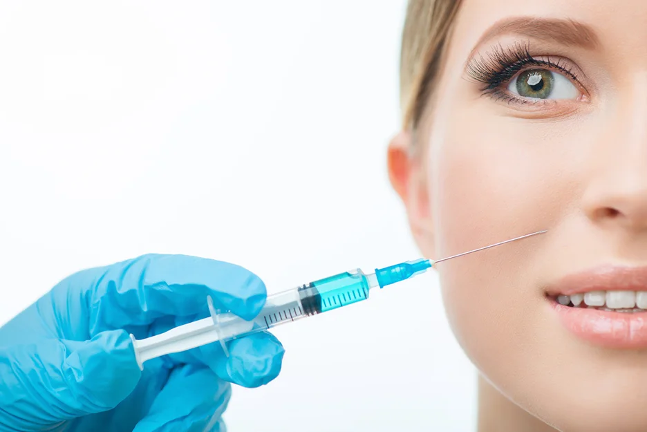 a woman getting cheek fillers